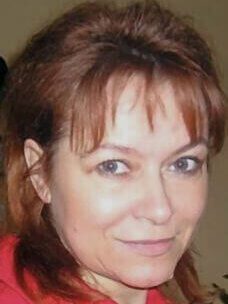 Uśmiechnięta twarz autorki e-booków i minilekcji.